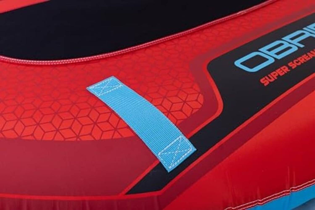 Red towable tube with blue handle webbing and black branding panel