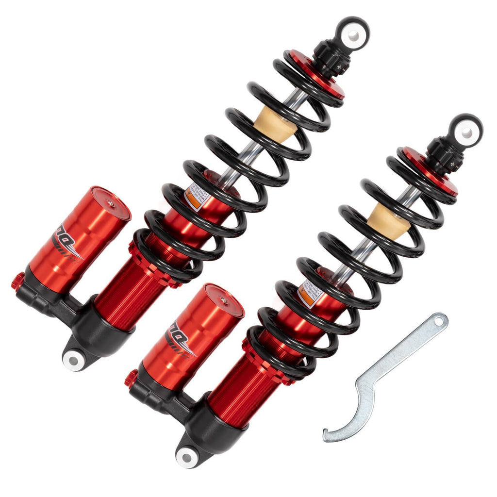 Overhead view of red and black coil shock absorbers set with included wrench