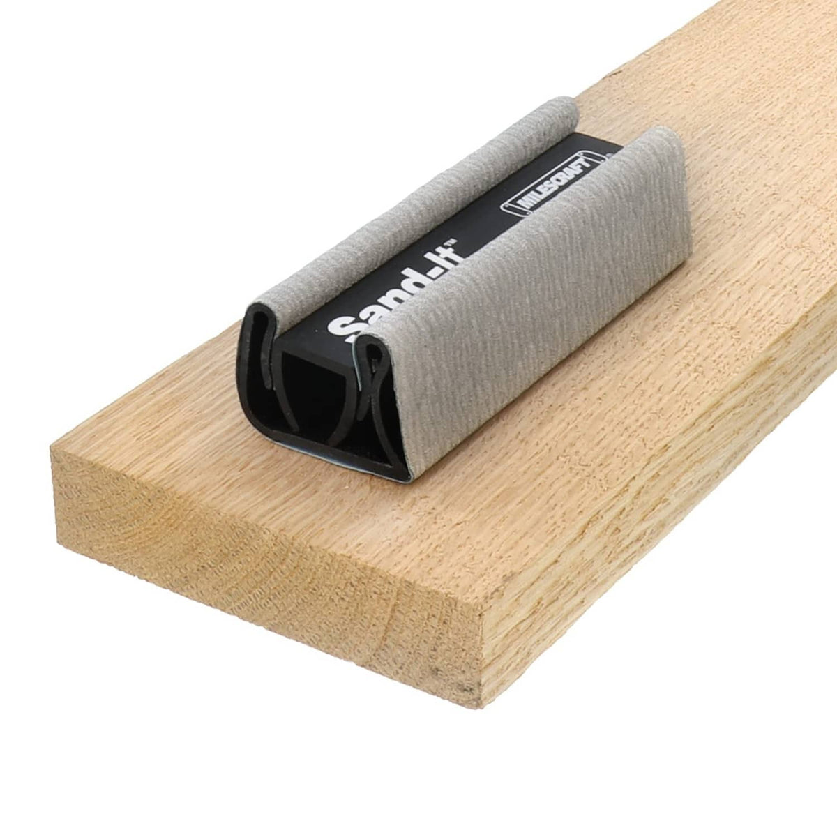 Milescraft Sand-It sanding block on wood, gray sleeve in black U-shaped frame