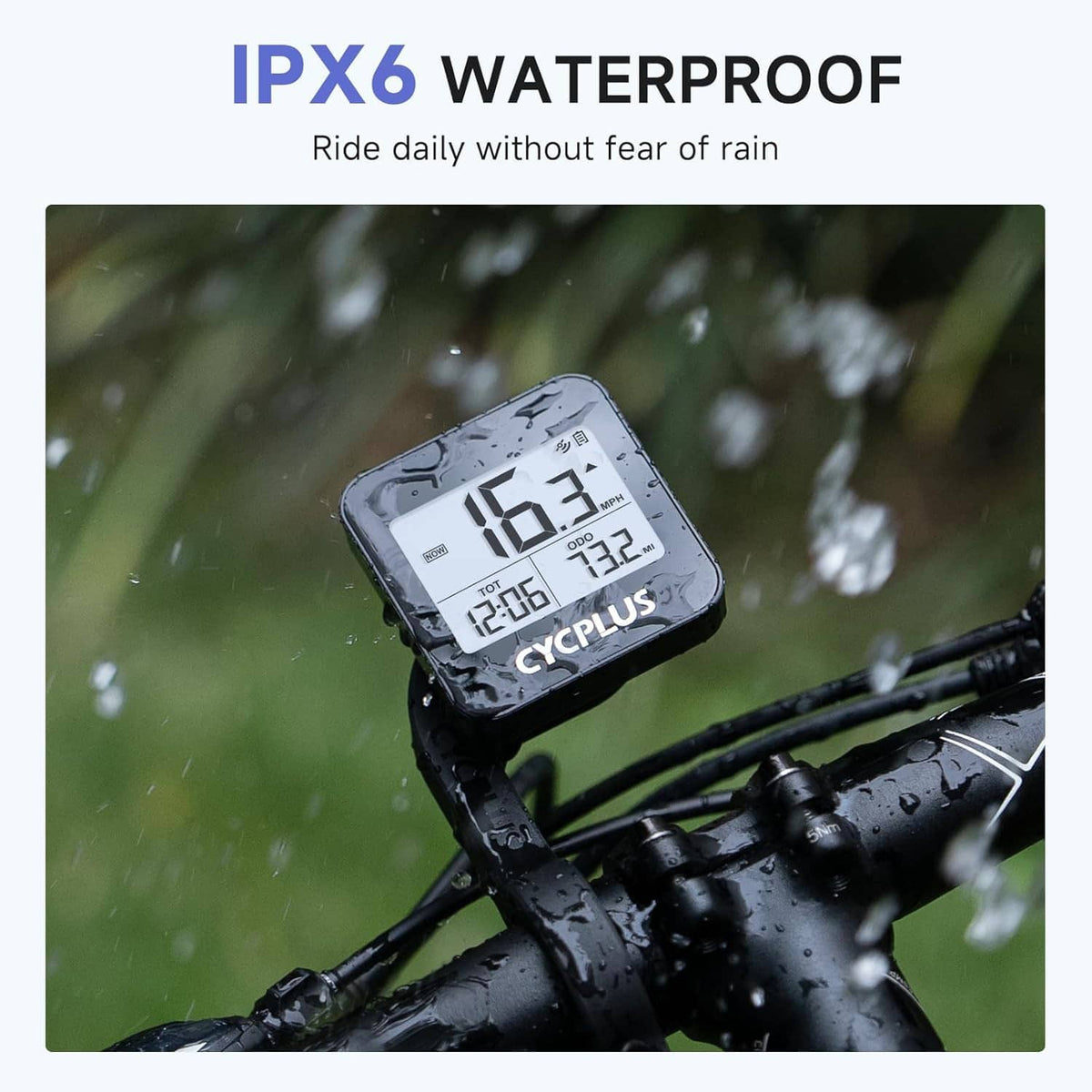 Waterproof GPS bike computer mounted on handlebars with raindrops on the screen