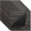 Gray square carpet tiles with textured striped surface, modular rug pieces