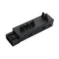 Black power seat switch module with multiple button sockets and connector tab
