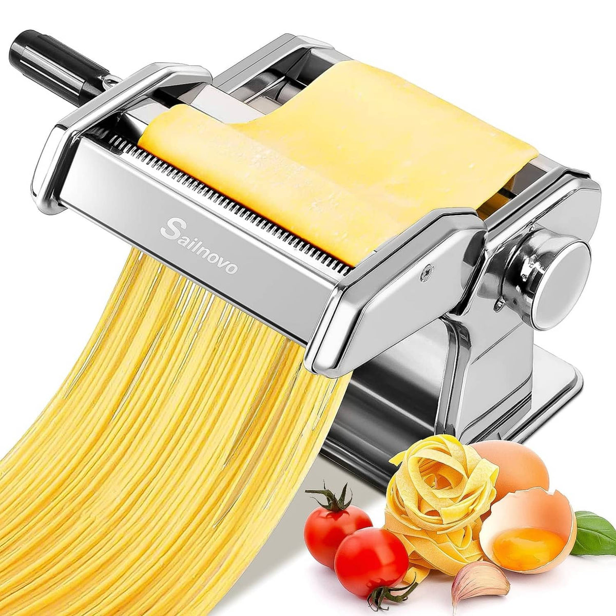 Silver manual pasta maker with cutting rollers, pressing fresh pasta sheets