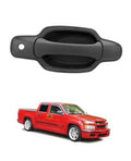 Dark gray exterior passenger door handle with oval grip and round mounting hole