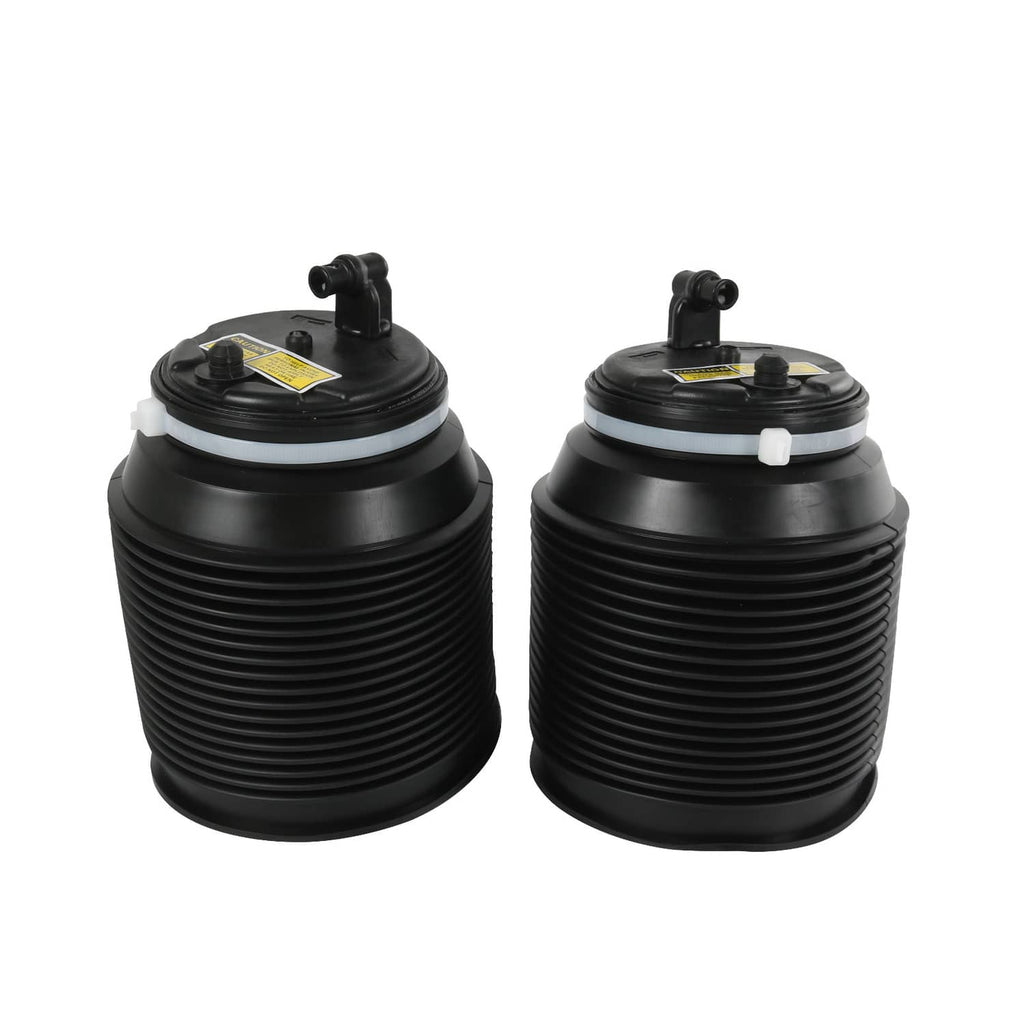 Pair of black air suspension spring bags with valve fittings on the top caps.