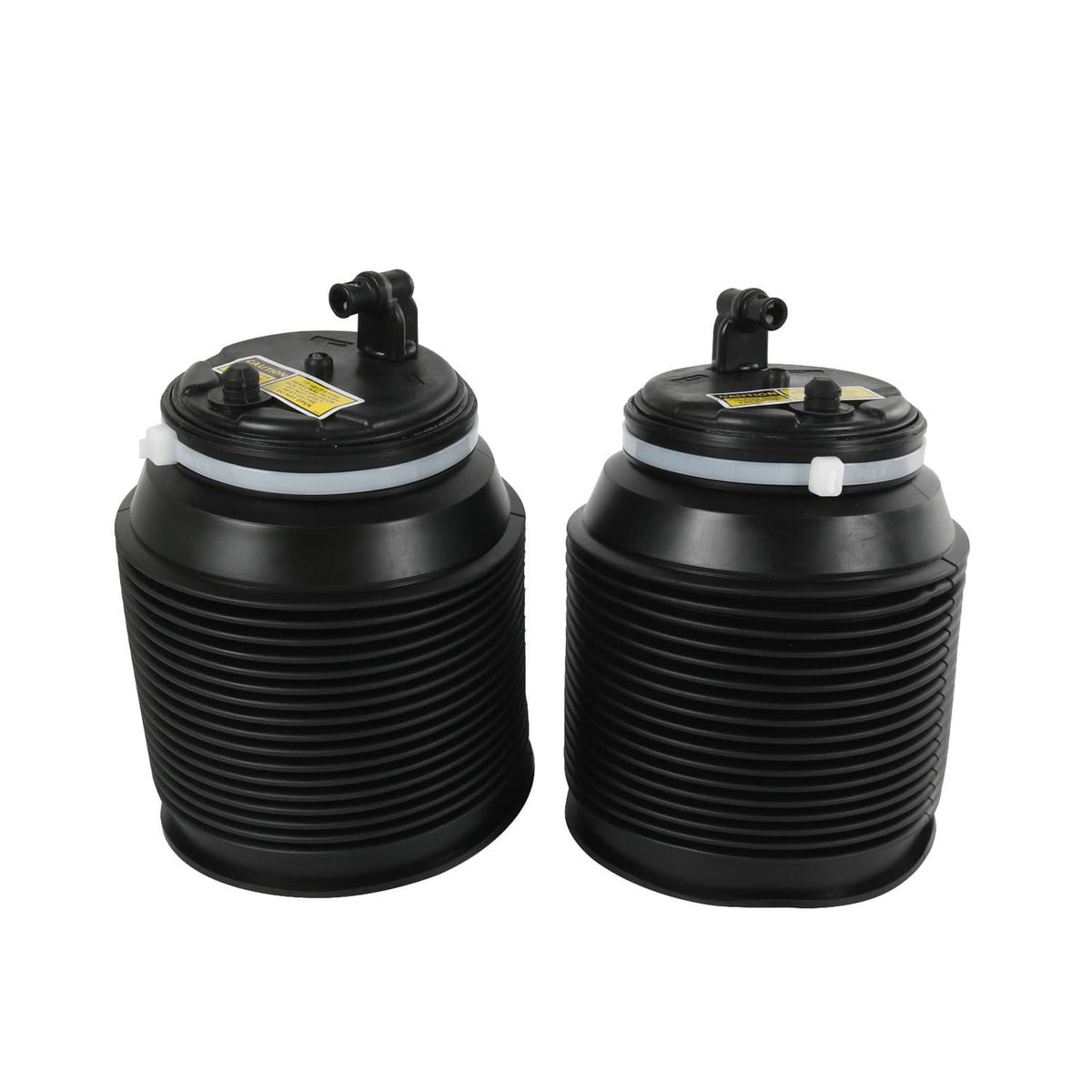 Pair of black air suspension spring bags with valve fittings on the top caps.