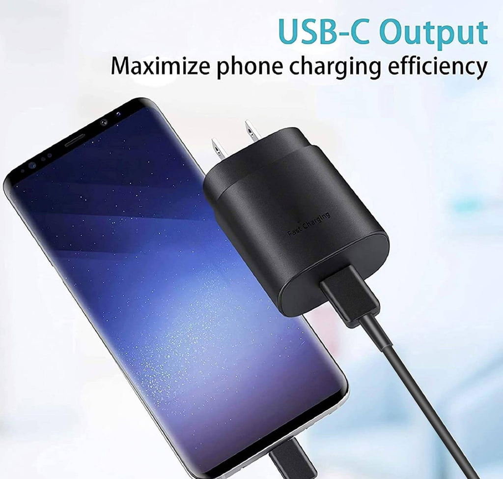 Black USB-C wall charger beside a smartphone with USB-C connection