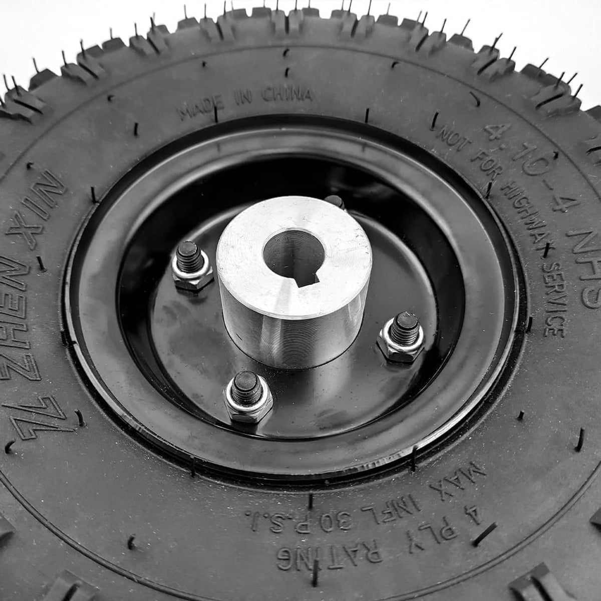 10-inch pneumatic off-road wheel hub with silver center plate and bolts