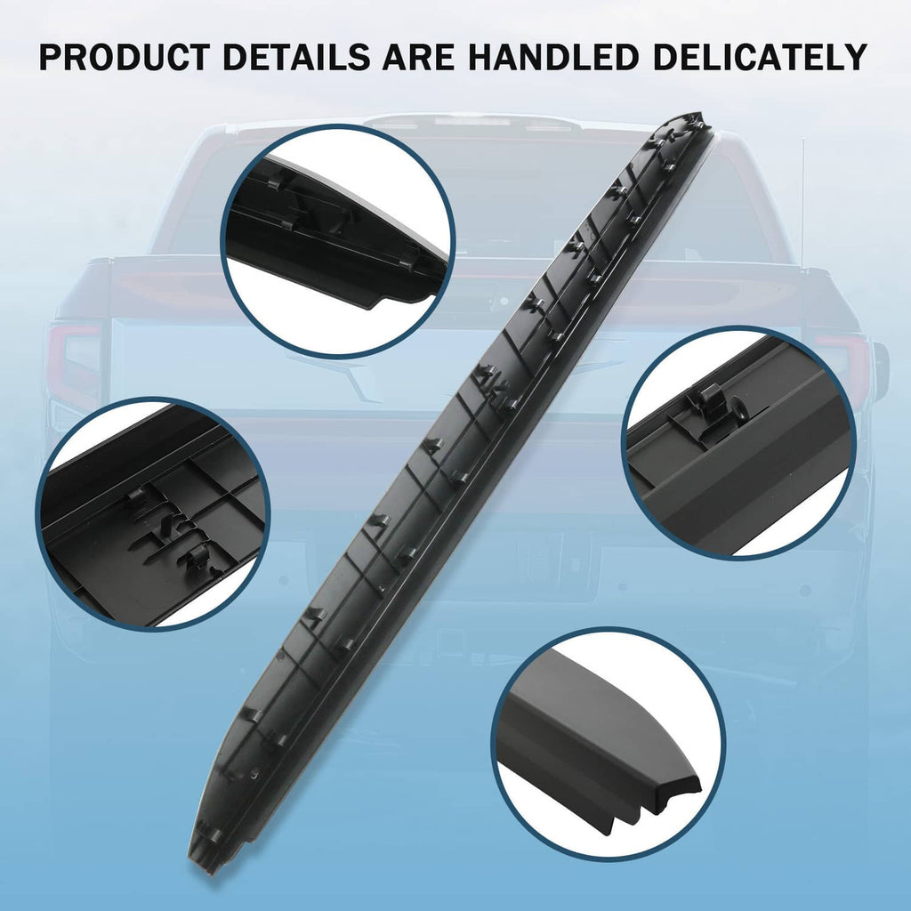 Black tailgate bed cap molding detail, textured surface and mounting clip sections