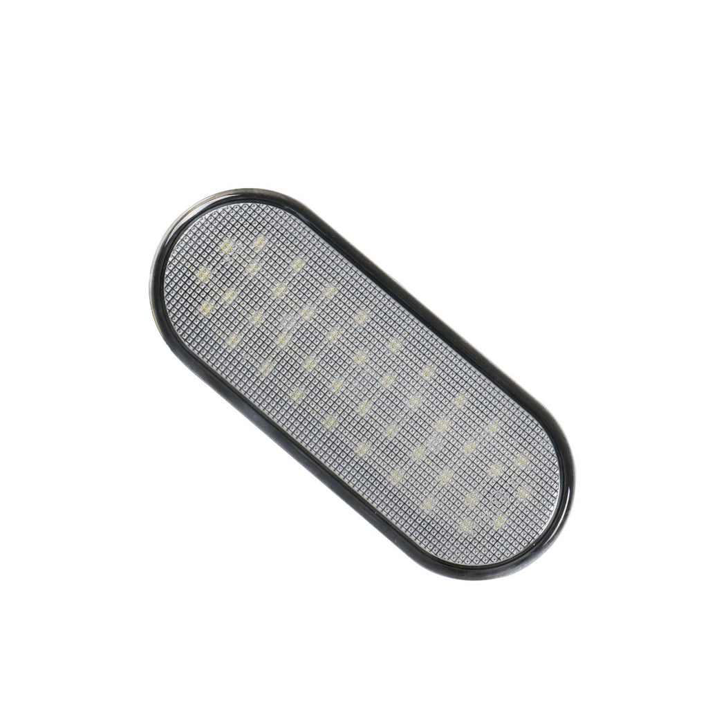 Oval LED bed light lens with textured grid pattern and black outer rim