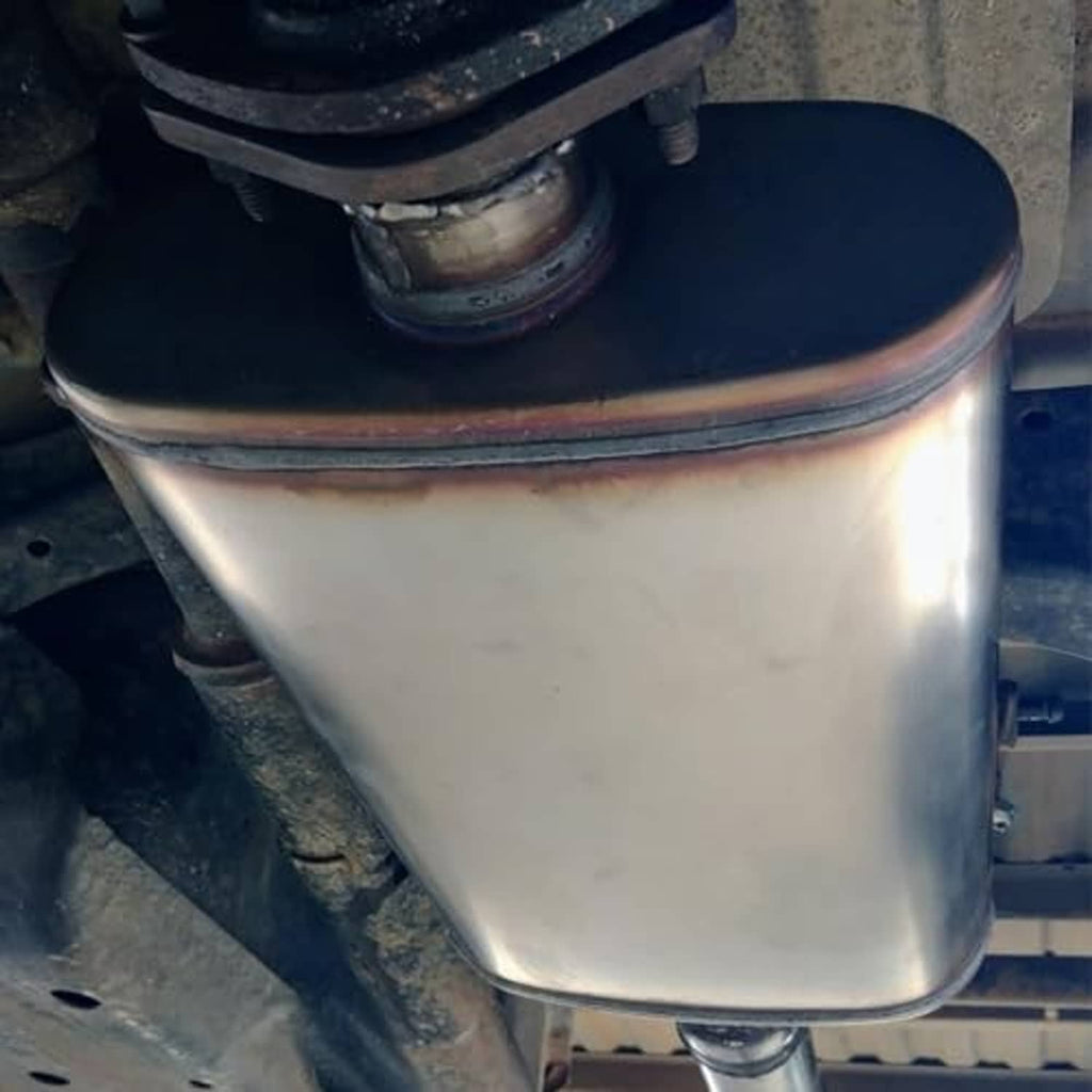 Stainless steel muffler installed on vehicle with round outlet
