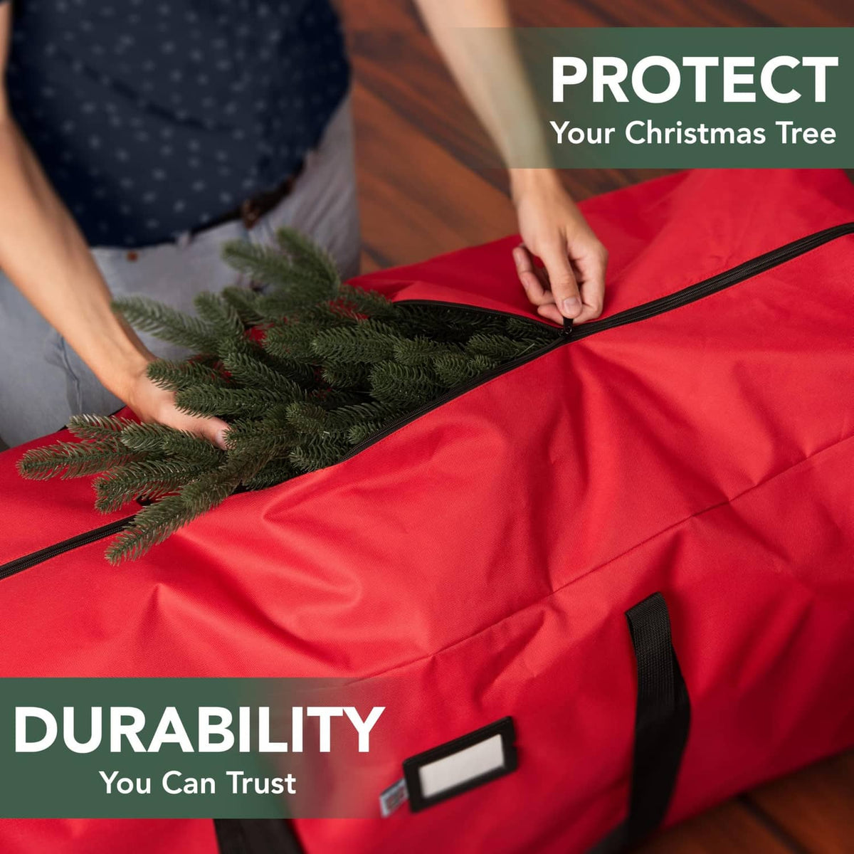 Red storage bag with black straps, opened with zipper top for tree packing