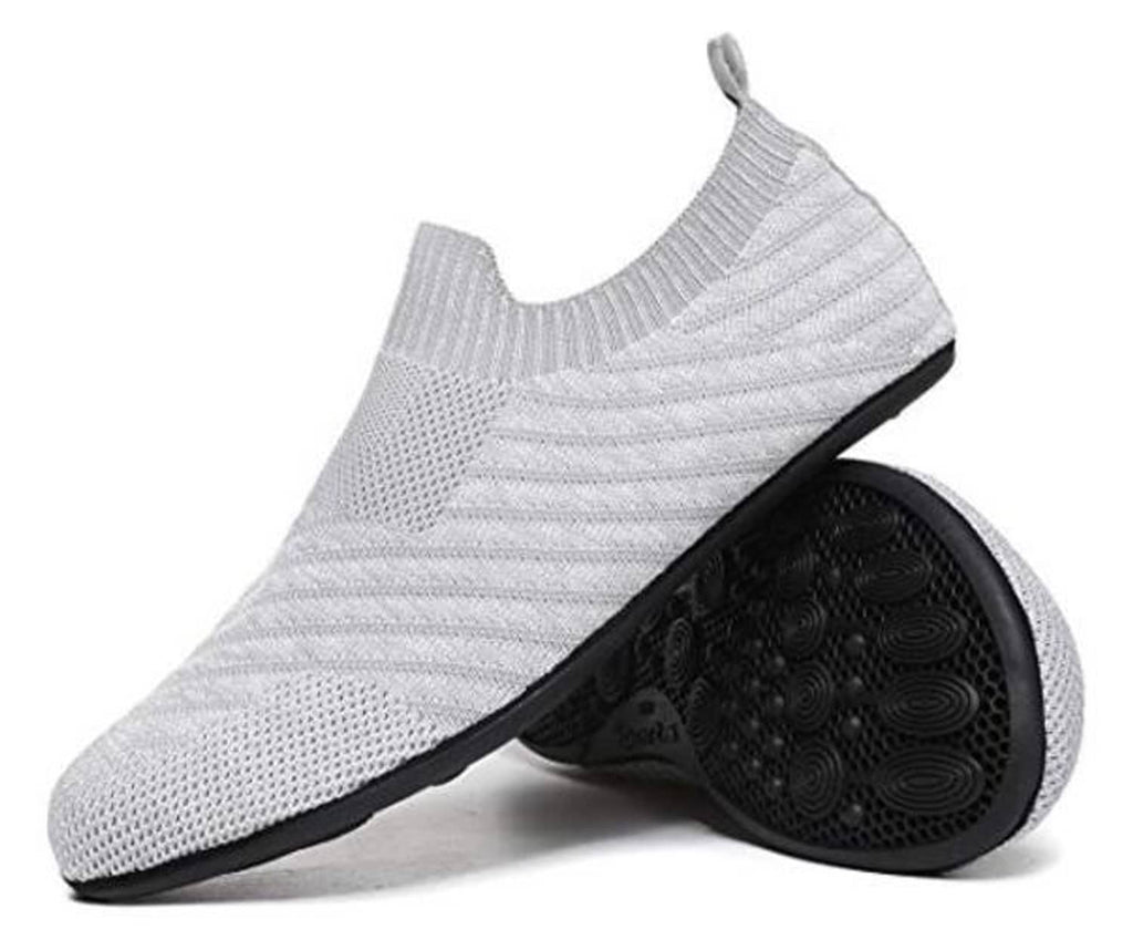 Light gray stretch knit slip-on indoor shoe with textured black grip outsole