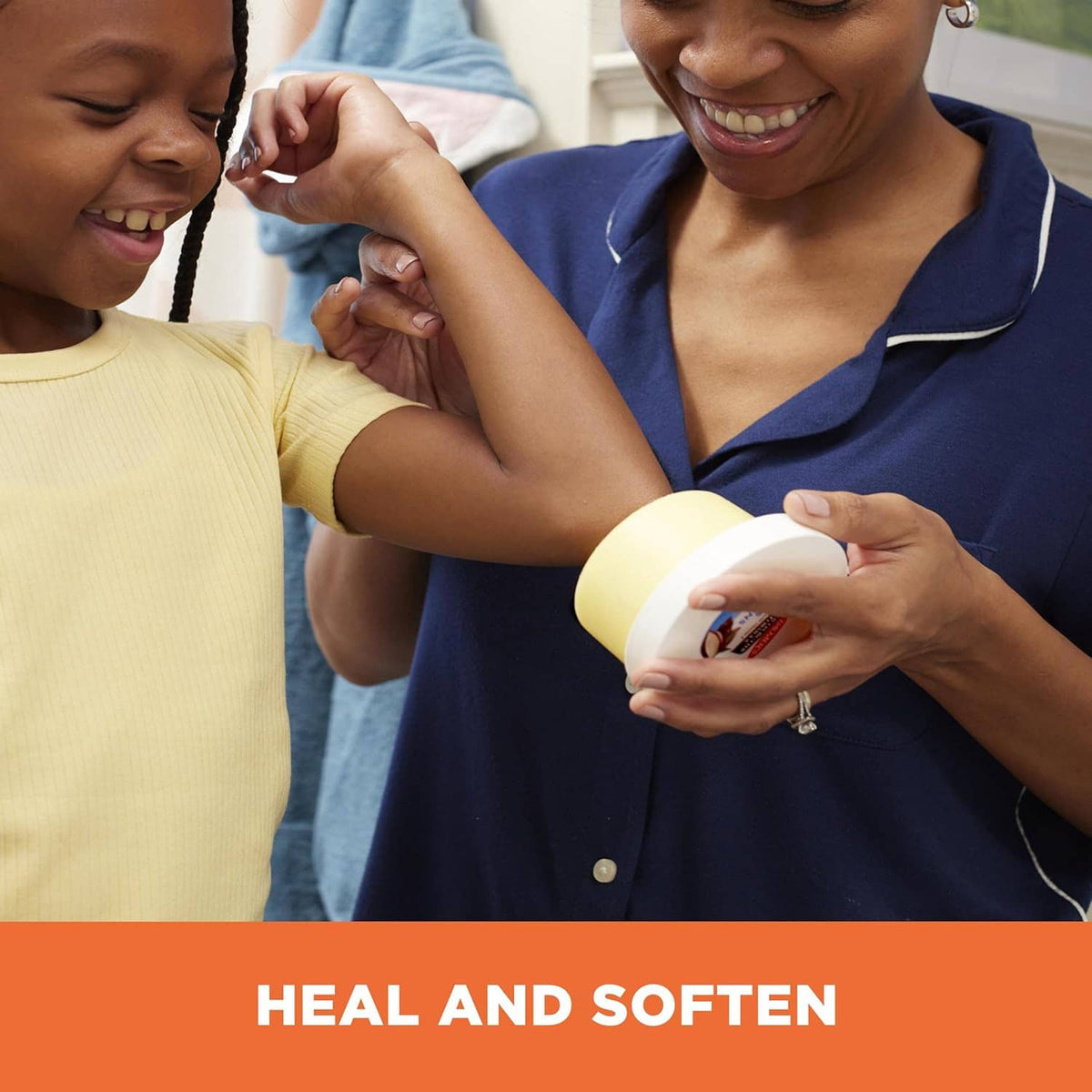 Solid lotion jar being applied to a child’s arm by an adult hand