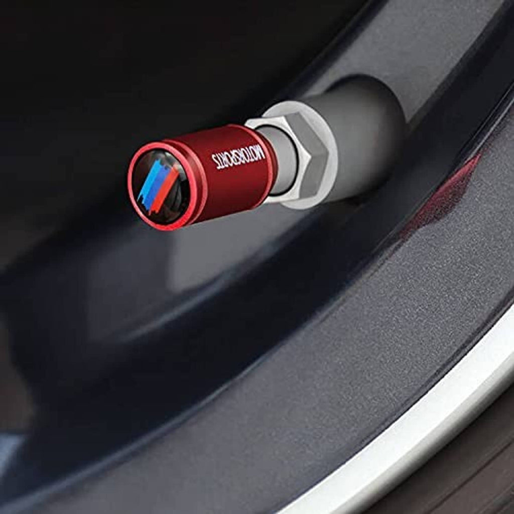 Red wheel valve stem cap with blue stripe insert and silver base ring