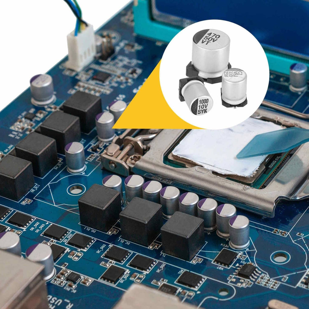 Aluminum electrolytic capacitors on a blue circuit board, silver cans