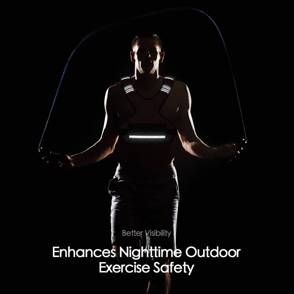 Pink weighted vest with dark front pocket and reflective bands for nighttime visibility