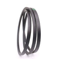 Black V-belt close-up, coiled loops with ribbed outer edges