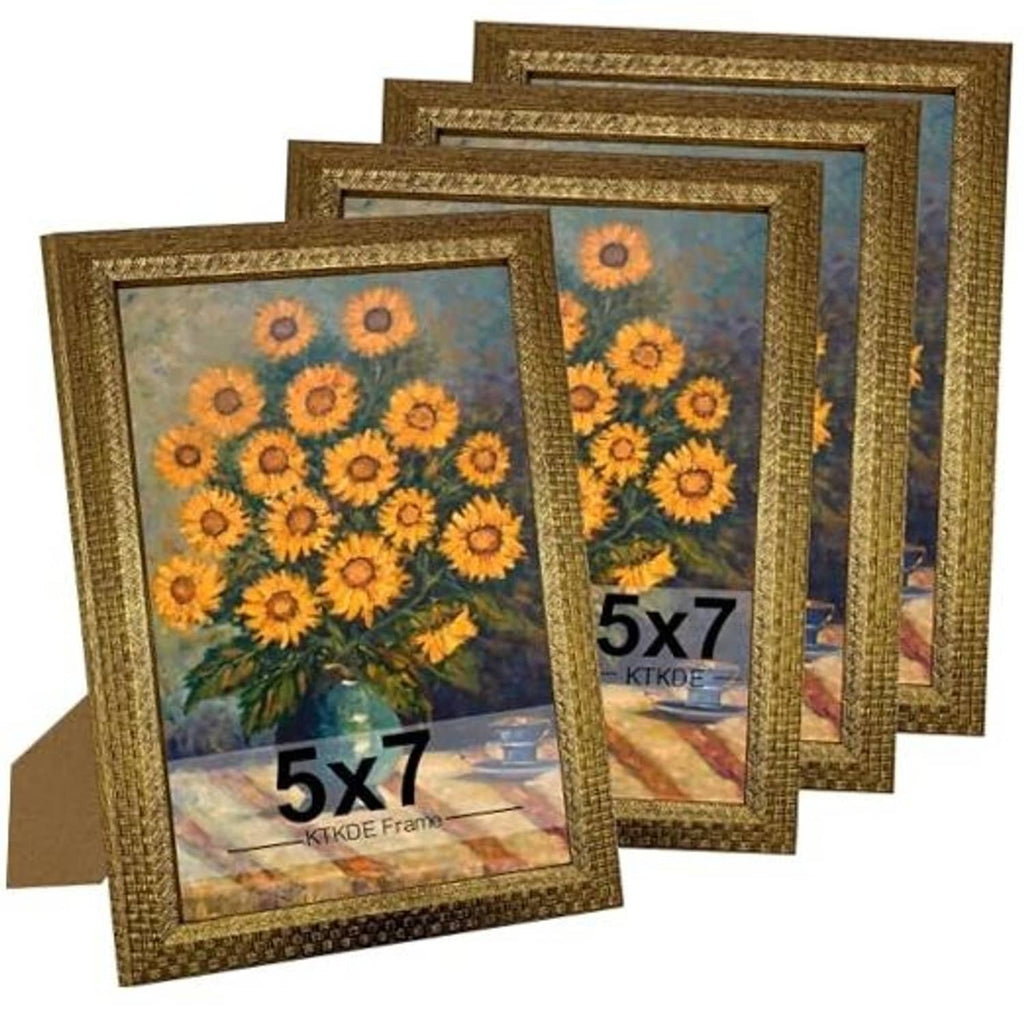 Set of four ornate gold 5x7 photo frames with textured vintage border