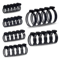 Set of black worm gear hose clamps with perforated bands and screw housings