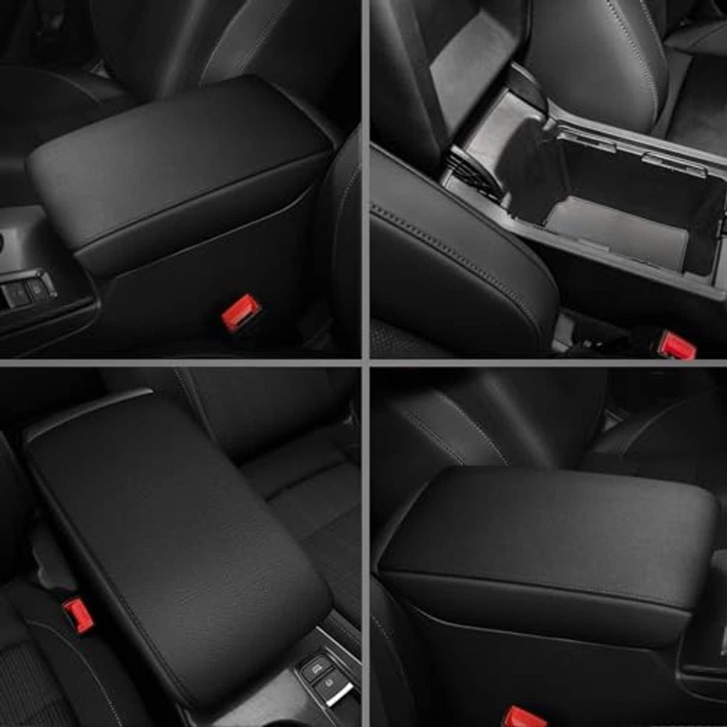 Black padded armrest on car seat area, with seam and release slot visible