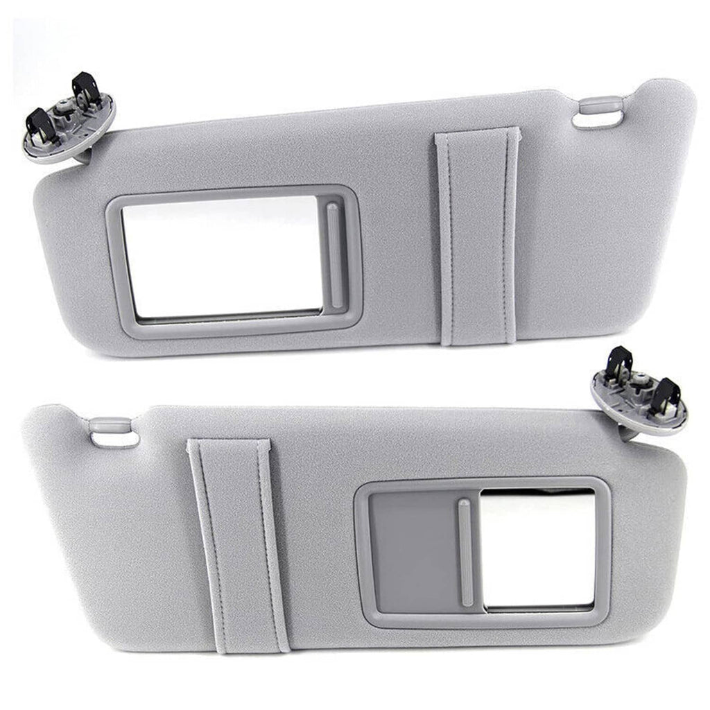 Gray pair car sun visors with mirror windows and plastic mounting clips, top and bottom