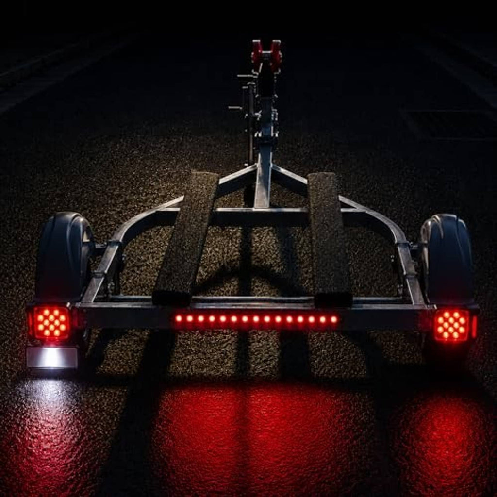 LED boat trailer lights kit with red rear lights and illuminated light bar on trailer