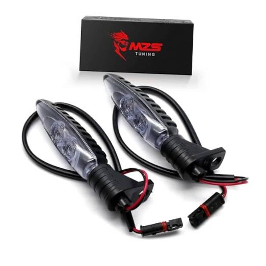 Motorcycle LED turn signal light set with clear lenses, black housings, and wiring connectors