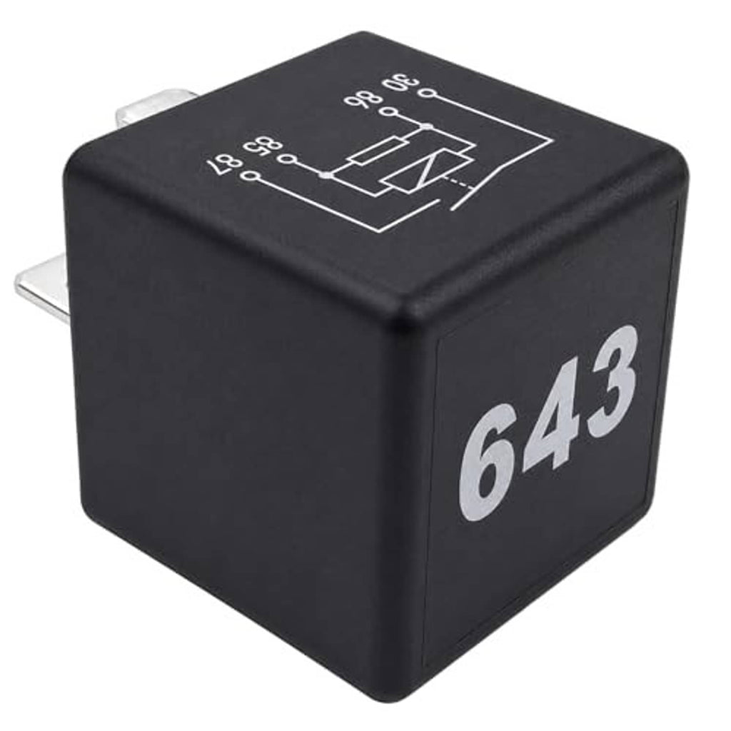Black automotive relay cube with “643” marking and white wiring diagram on top