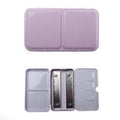 Pink watercolor tin palette case with two hinged lids and empty mixing wells