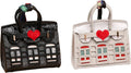 Black mini backpack keychain pouch with heart charm and white building print.