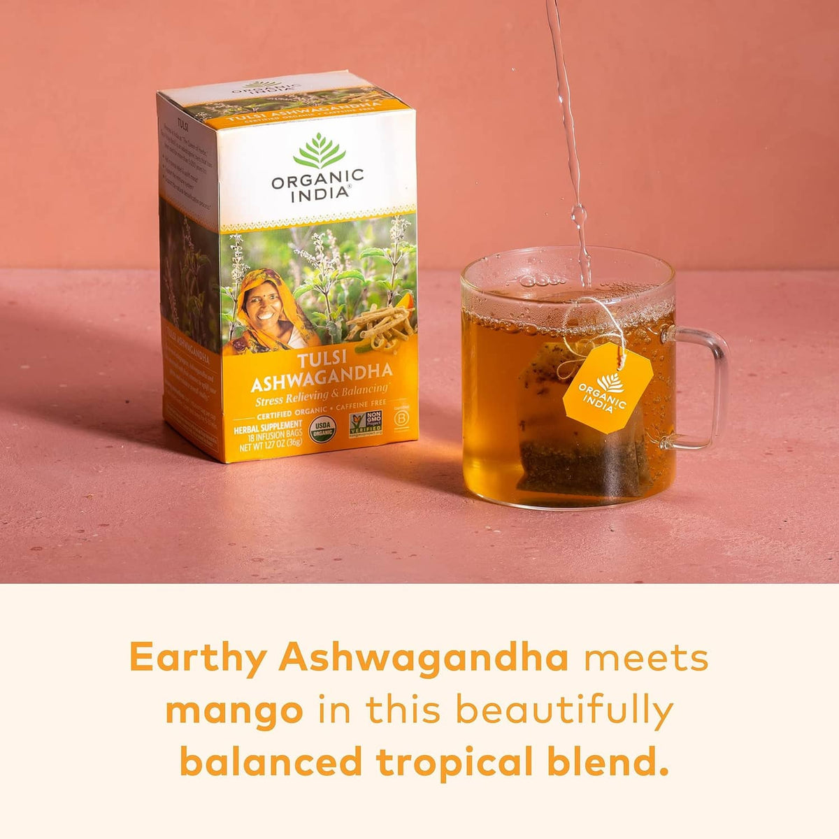 Tulsi Ashwagandha herbal tea box with mug of brewed tea and tea stream.