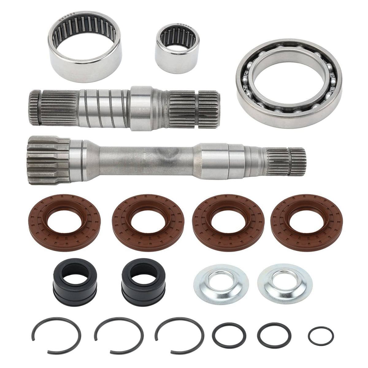 Front differential rebuild kit layout: shafts, bearings, seal rings, axle boots, snap rings