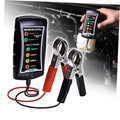 12/24V battery and alternator tester with red and black clamps in car engine bay