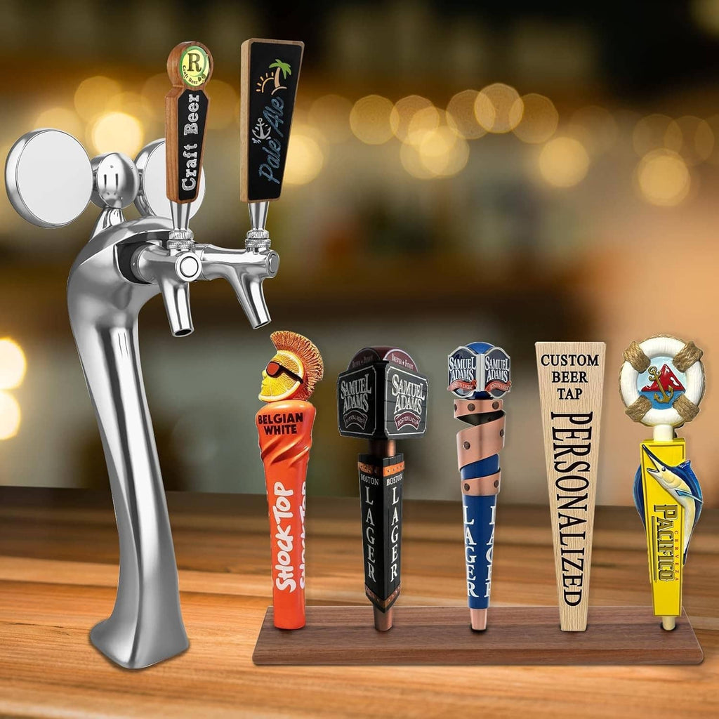 Brown wooden beer tap handle display with four colorful replica tap signs beside faucet