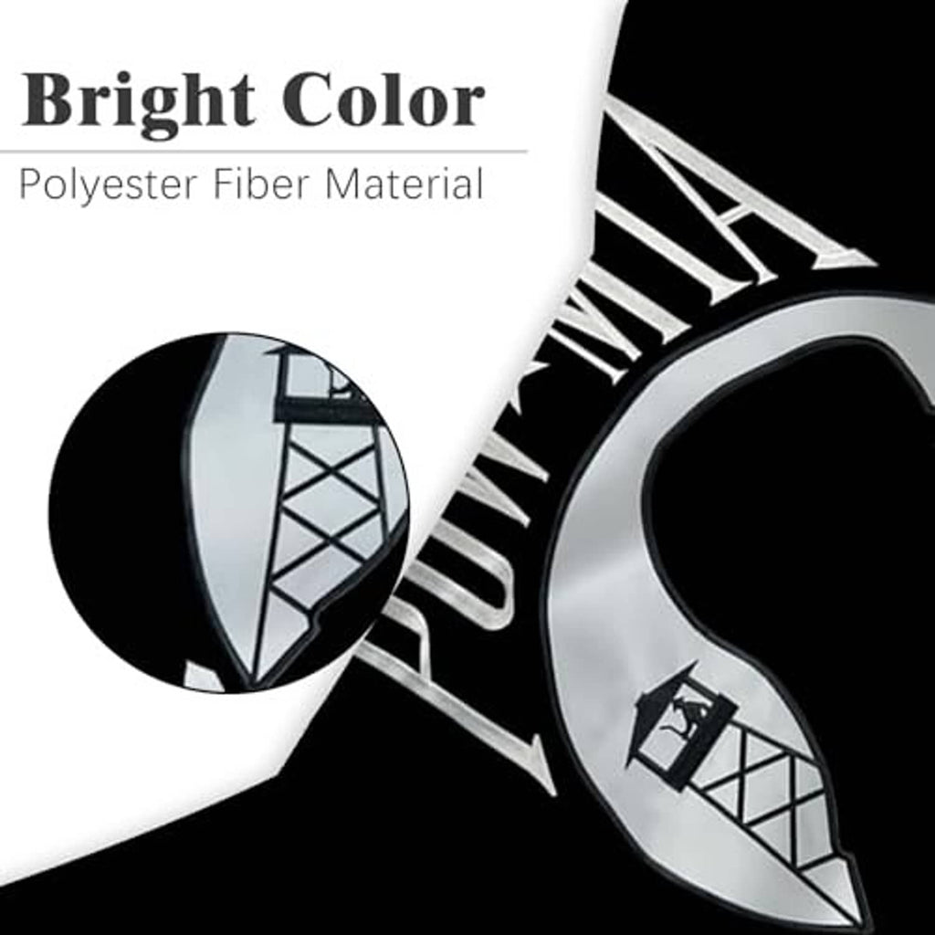 Embroidered flag corner detail with gray circular emblem on black