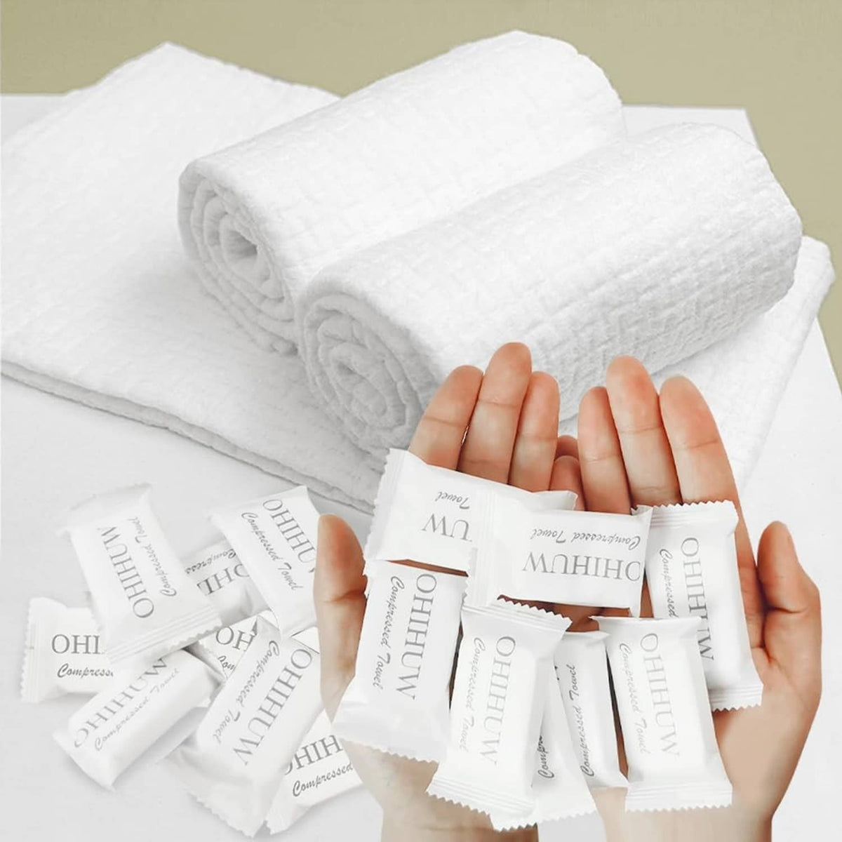 White compressed disposable towels, rolled stack with individual wrapped packets