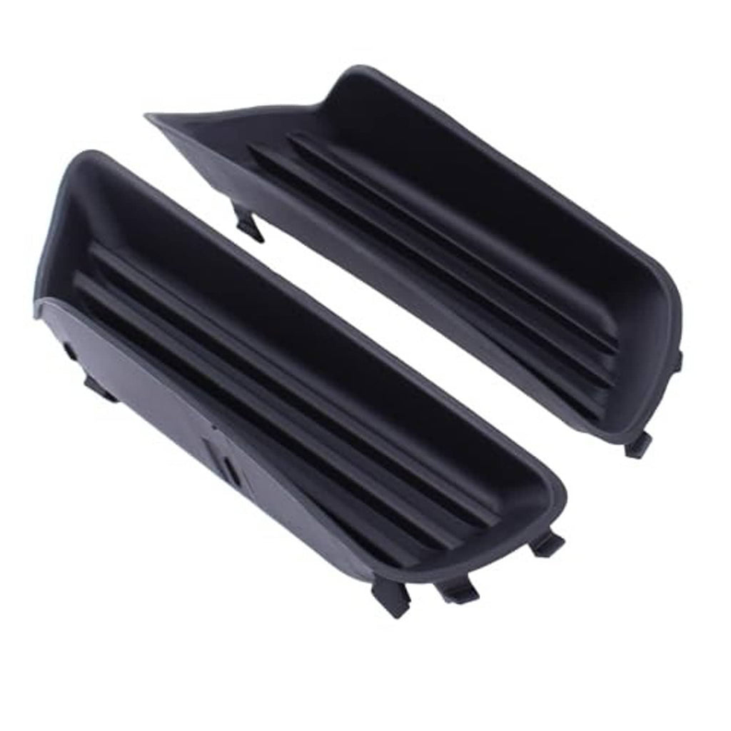 Two black fog light cover grilles with vented slats and mounting tabs