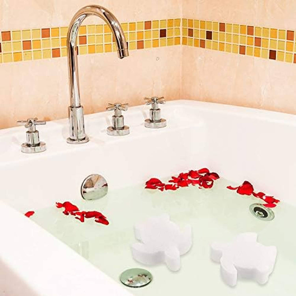 White turtle-shaped foam sponges placed in a hot tub filled with water