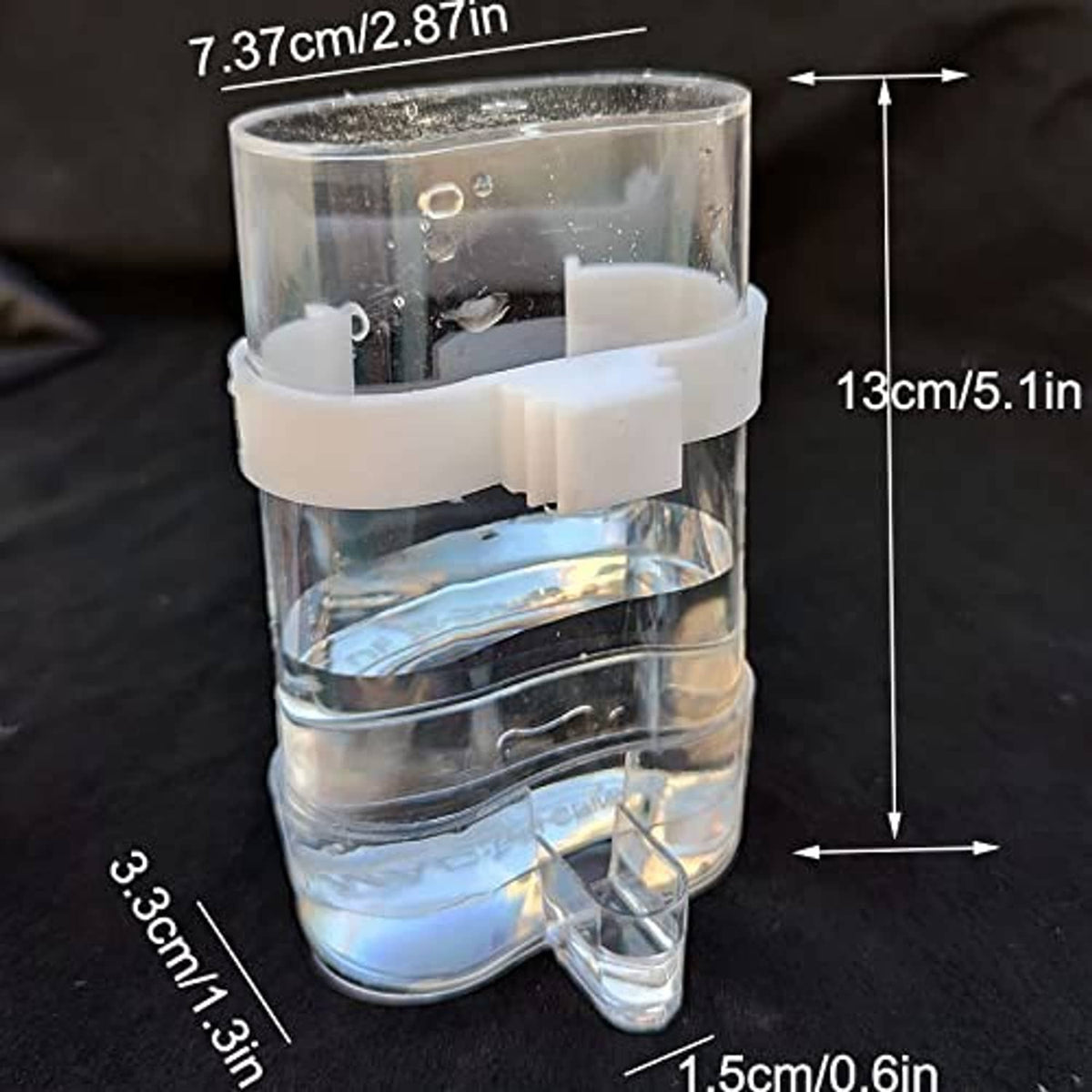 Clear automatic bird waterer for cage bars with white mounting bracket and spout