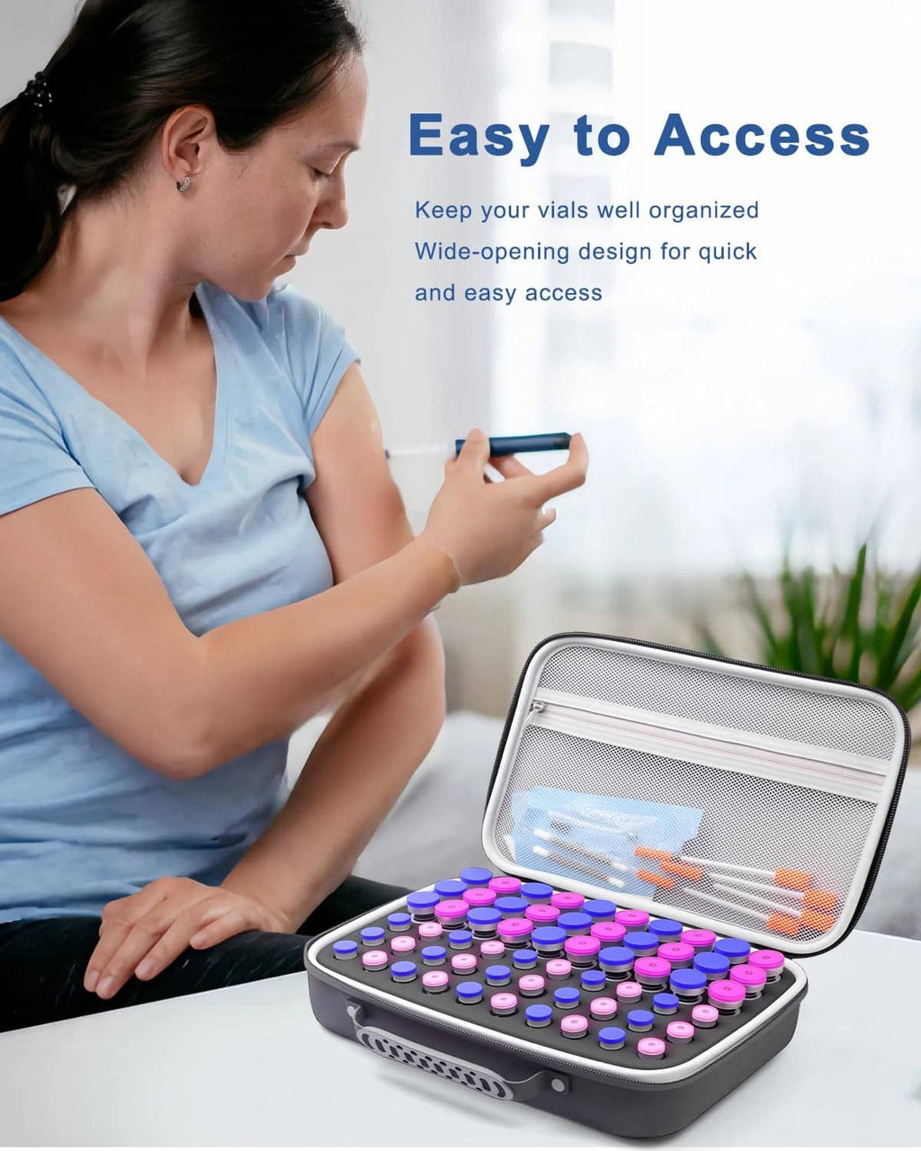 Black insulin vial protector case open on a table with organized foam slots
