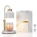 White and gold candle warmer lamp on base with glass shade and arched handle