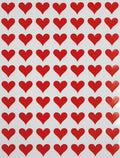 Sheet of red heart stickers in a repeating pattern on a white backing