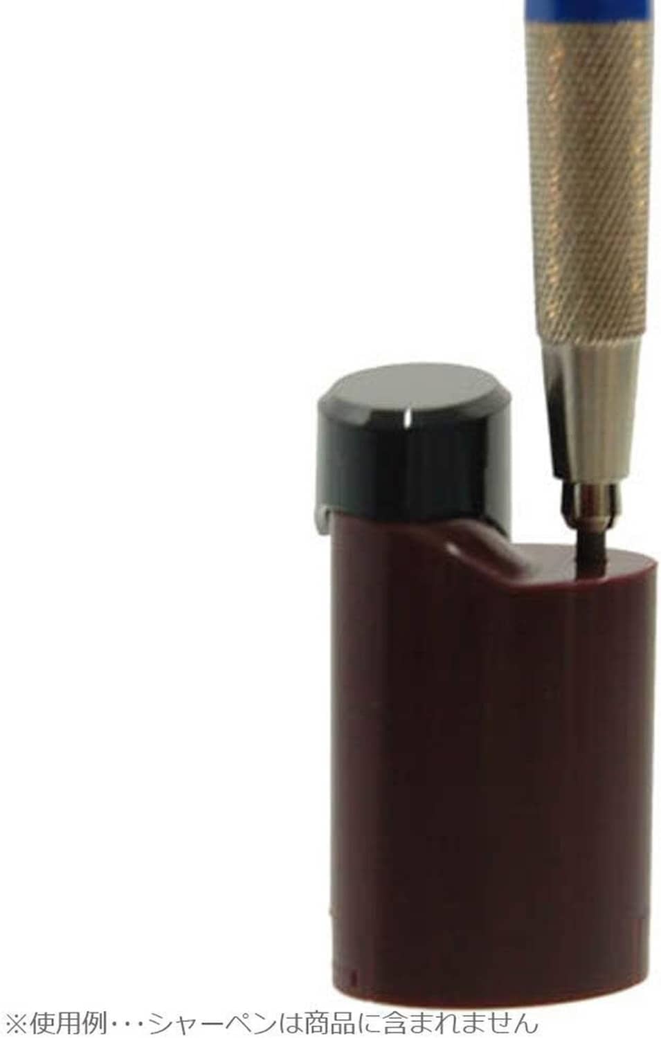 Pocket pencil sharpener with exposed blade and pencil tip inserted