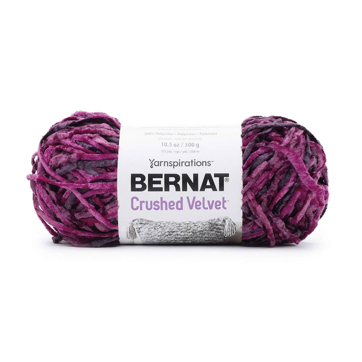 Bright magenta crushed velvet yarn skeins with wrapped label, bulky weight.