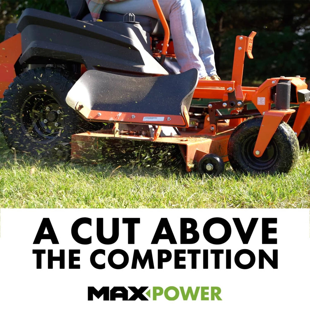 Lawn mower cutting grass with black cutting deck and blades
