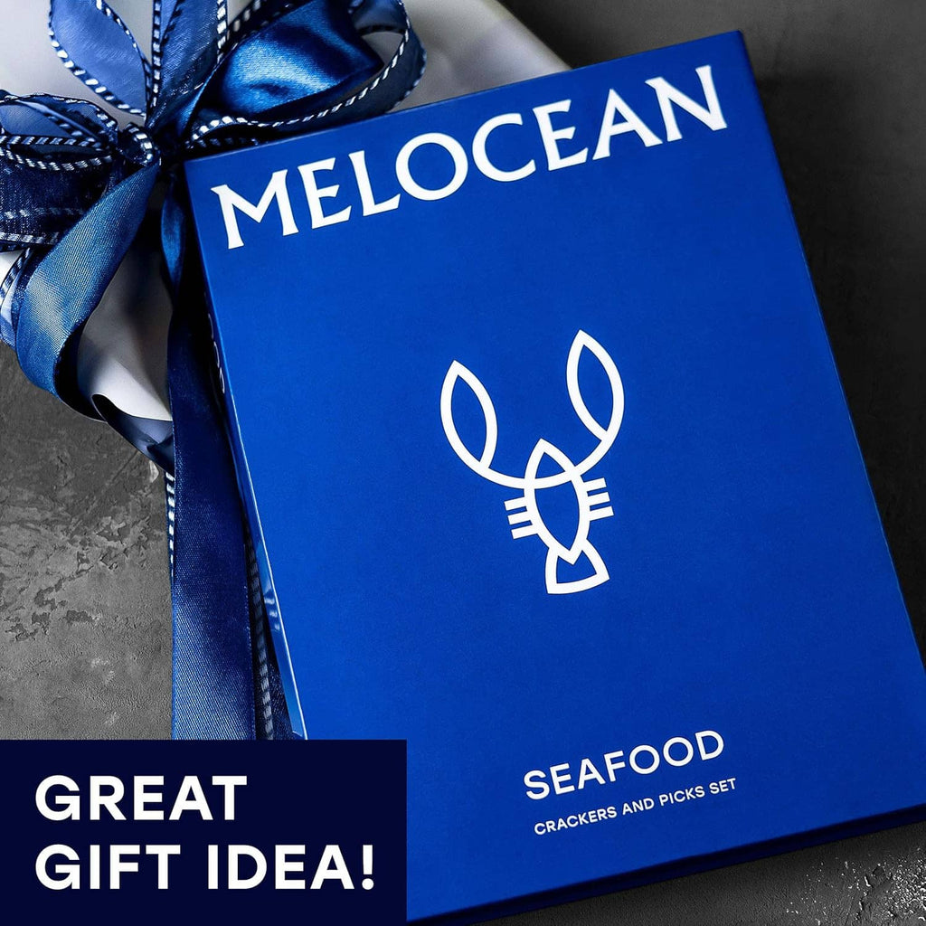 MELOCEAN seafood cracker and pick set gift box wrapped with blue ribbon