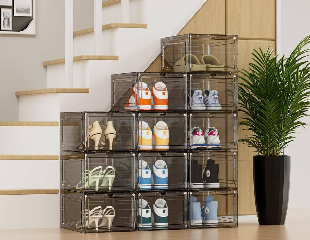Transparent stackable shoe organizer boxes with hinged clear doors and shoes arranged inside
