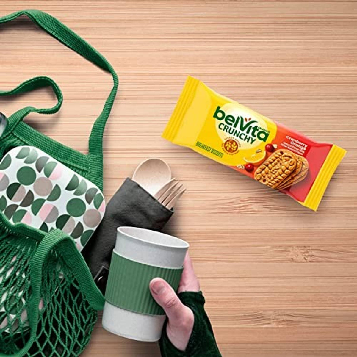 Belvita Crunchy cranberry-orange breakfast biscuits single pack with mug and utensils