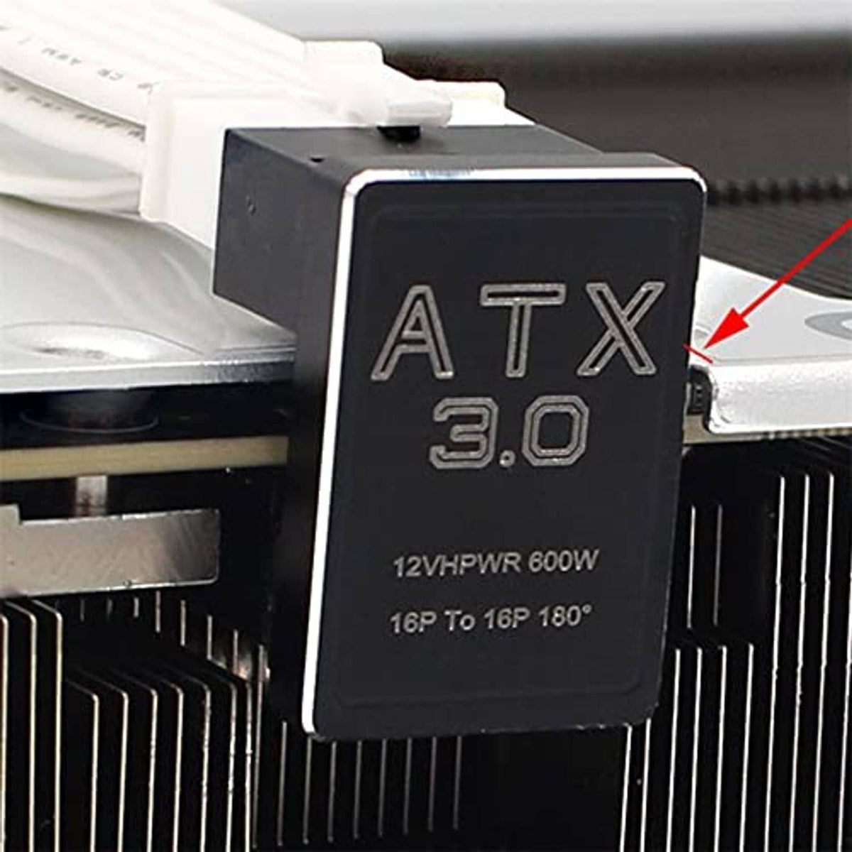 Close-up of ATX 3.0 12VHPWR 600W power adapter module on PC components
